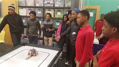 students playing with robots 
